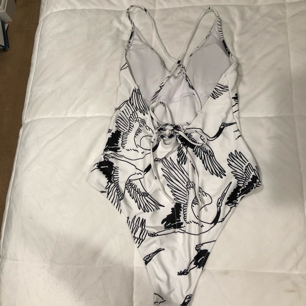 One piece black and white swim suit
